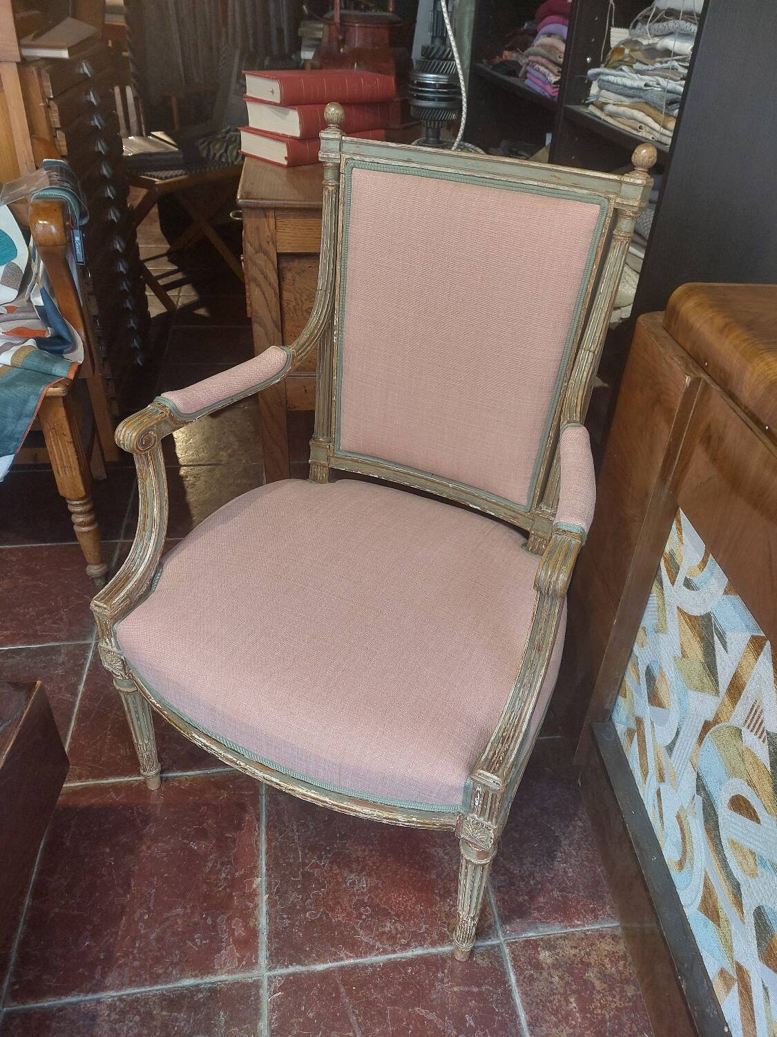 Patinated Louis XVI style armchair