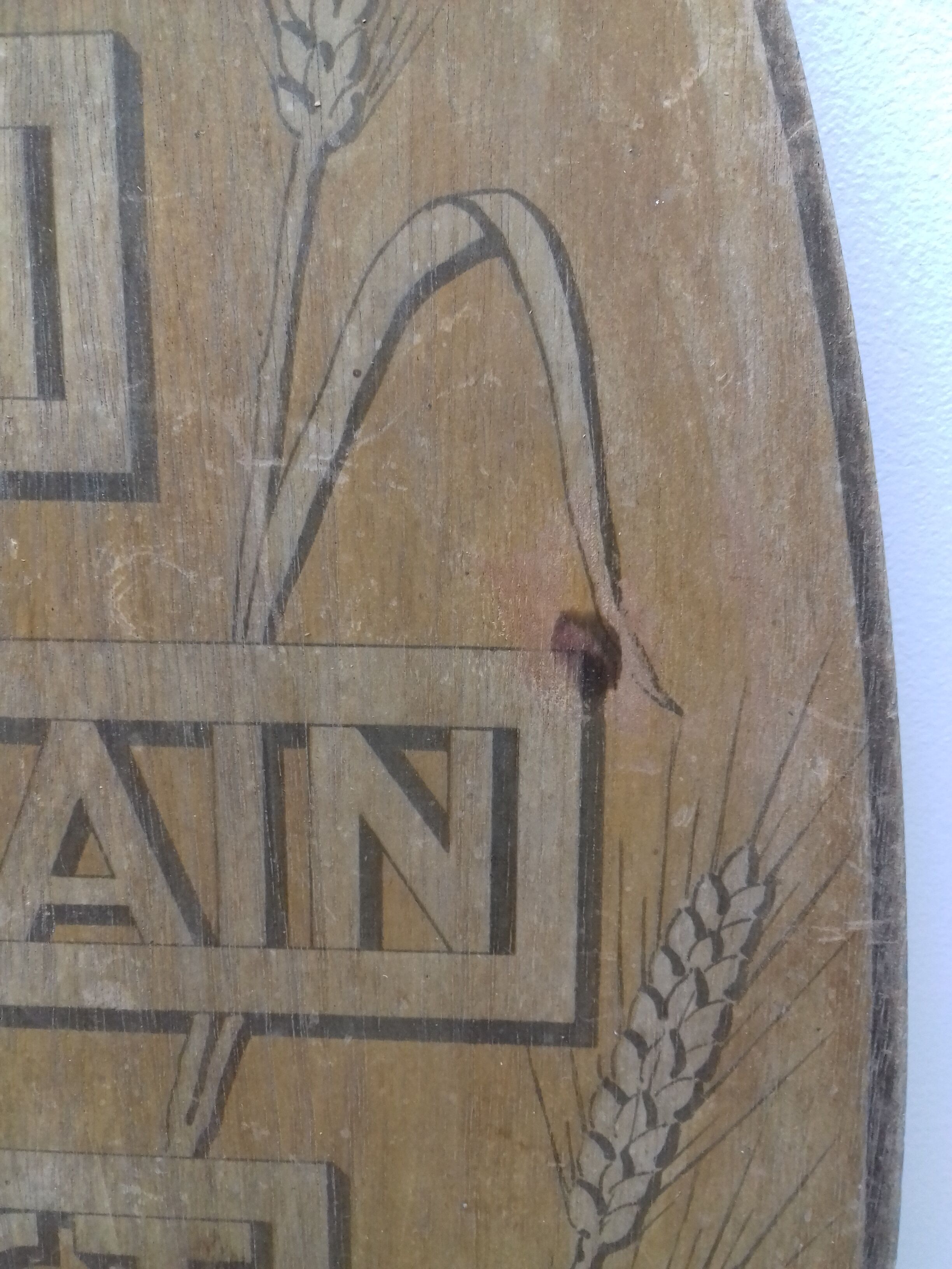 Bakery wood panel "here bread is baked over a wood fire"