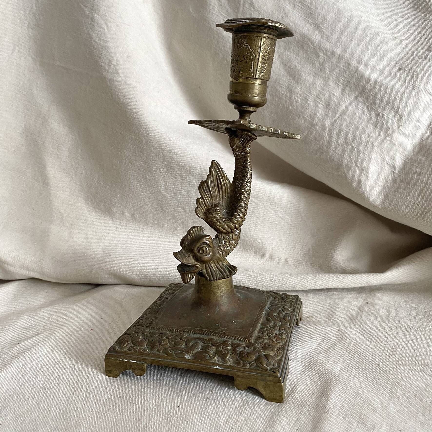 Antique dolphin candlestick from the 19th century, fish candlestick.
