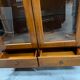 Vitrine en merisier 2 portes / 2 tiroirs