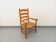 Vintage armchair in beech wood and straw from the 1950s.
