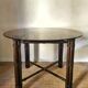 Table ronde en verre fumé