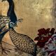Ancient Chinese screen decorated with peacocks and flowers on gold leaf