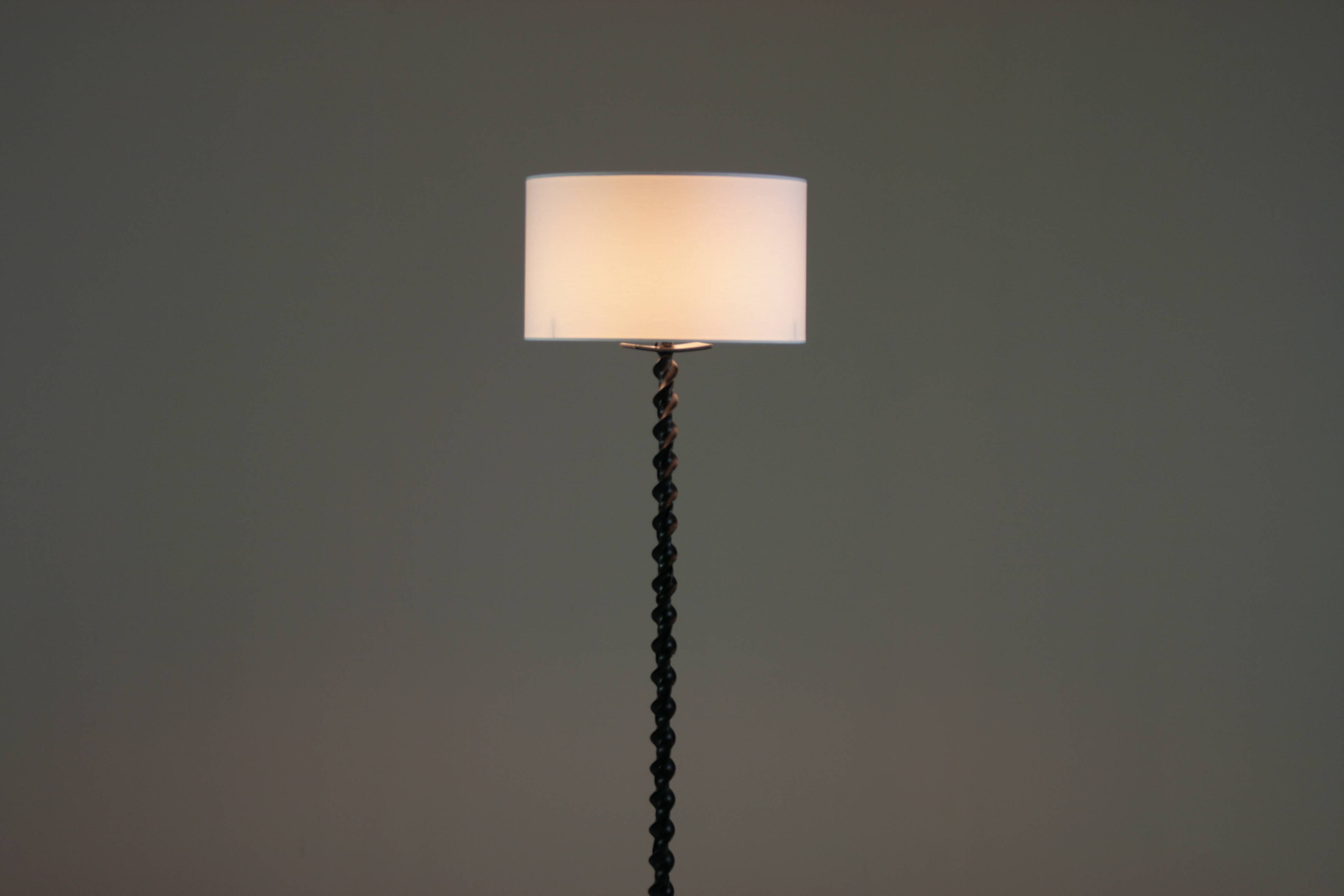 Twisted black metal brutalist floor lamp