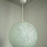 French suspended ceiling light in the shape of a white ball, Clichy 3336 glass shade.