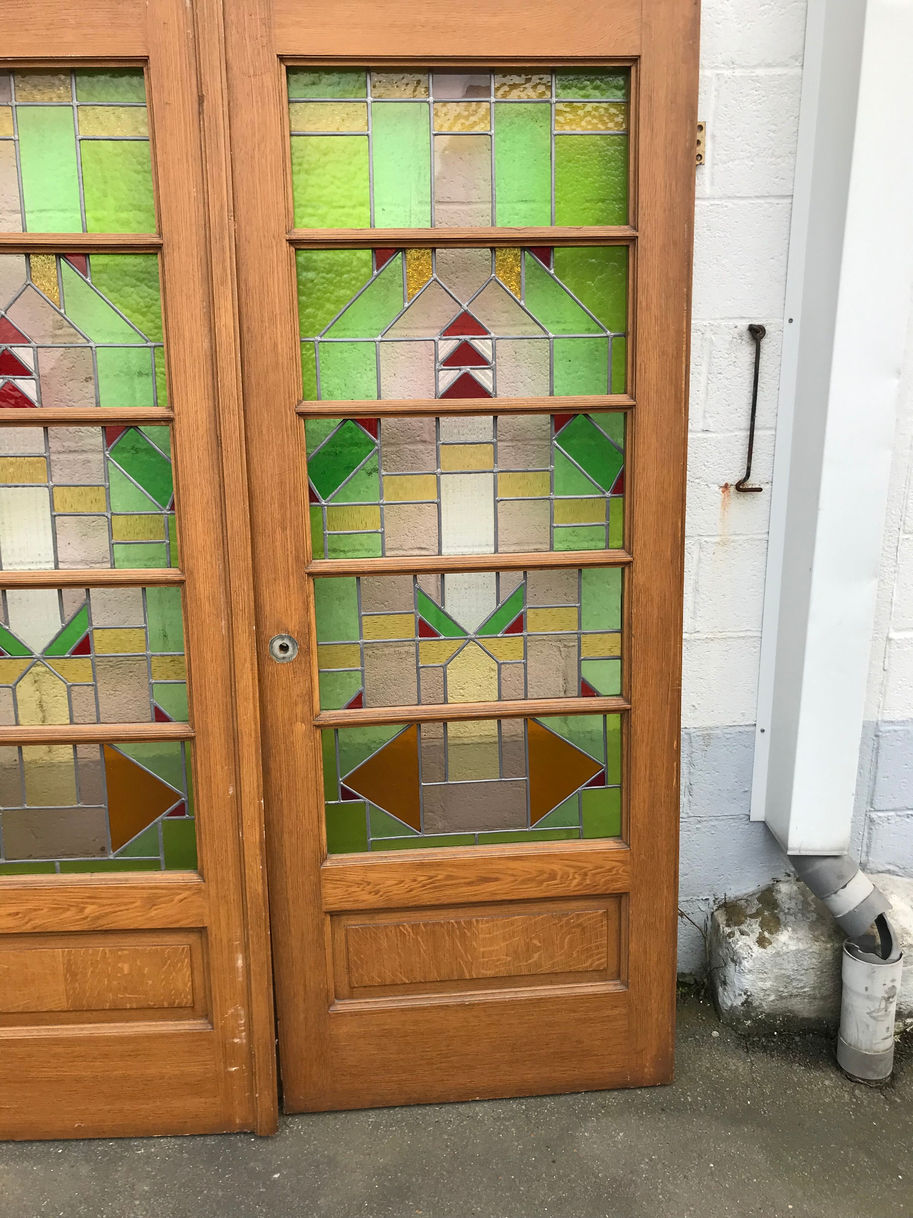 Series of three doors with stained glass windows