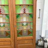 Series of three doors with stained glass windows