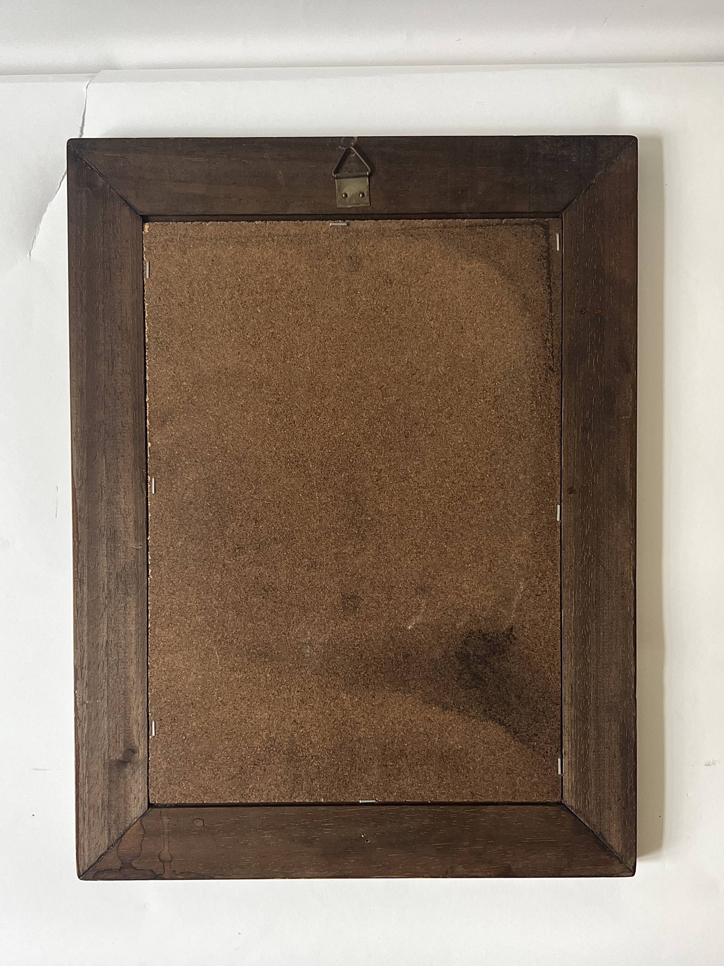 Brutalist rectangular wall mirror in solid wood, France 1950.