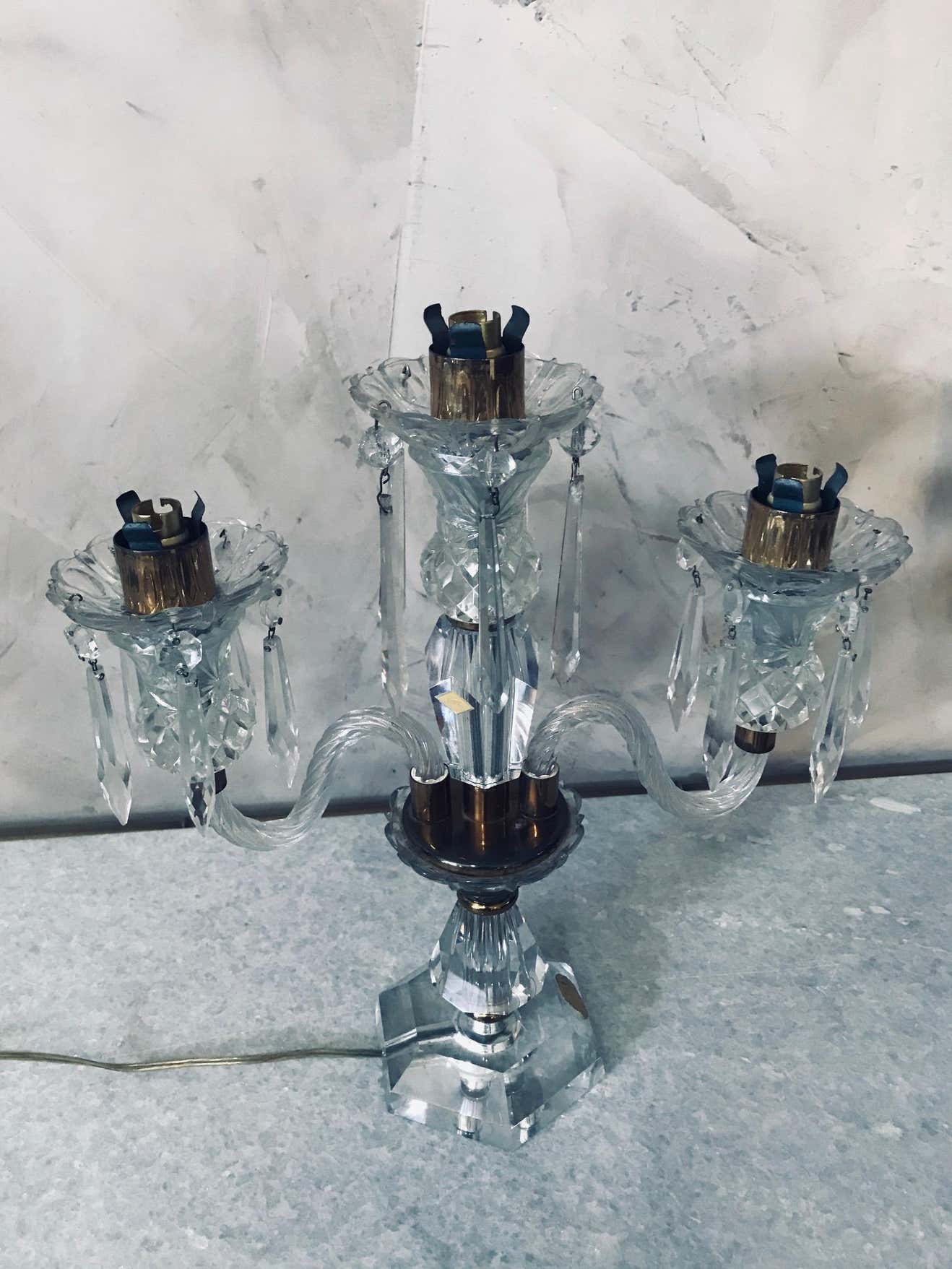 Pair of Sèvres candelabra in crystal and brass of the 20th century France 1950