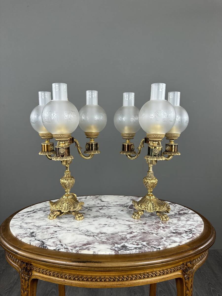 Pair of three-light candelabra in bronze, 20th century