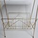 Vintage magazine shelf in glass and gilded metal