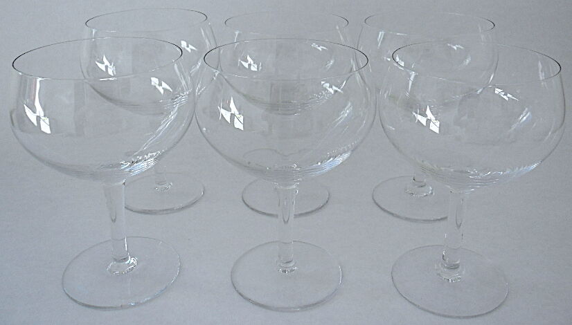 Suite of six beer glasses on foot in colorless crystal