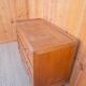 Compass feet chest of drawers