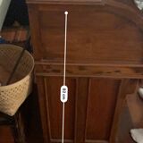 Antique solid wood secretary with a drop-down cylinder compartment.