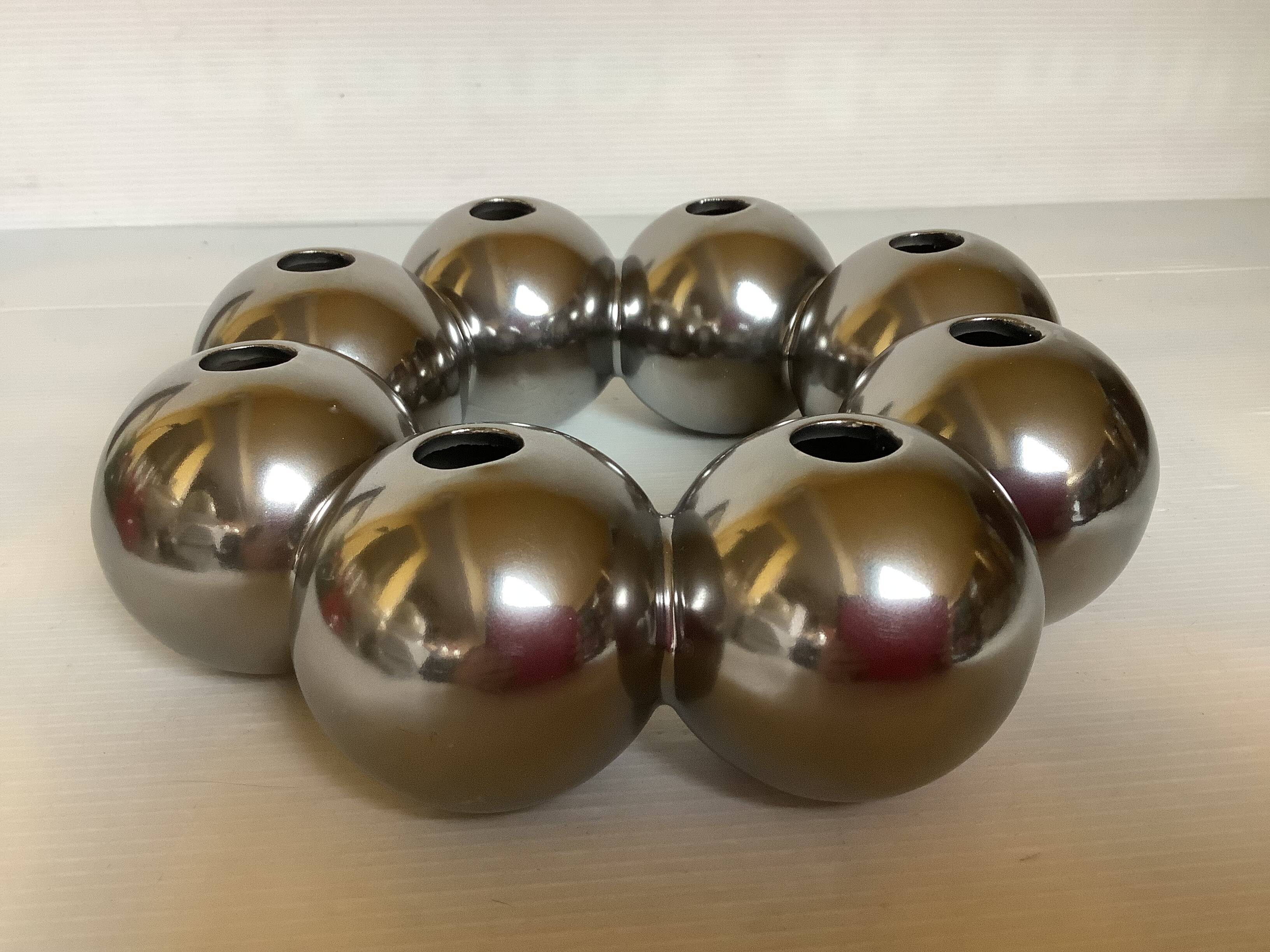 Silver flower vase in a crown shape.