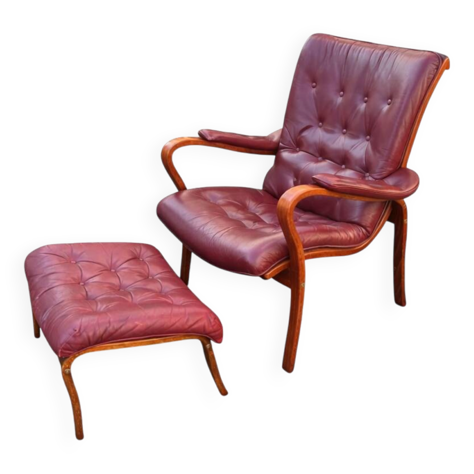 Scandinavian armchair with footrest