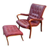 Scandinavian armchair with footrest