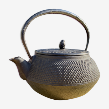 Black cast iron teapot