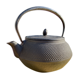 Black cast iron teapot