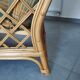 Vintage armchair in bamboo and rattan with a tartan pattern.