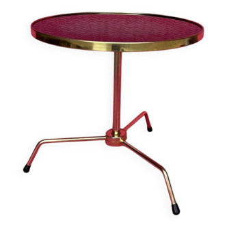 Gueridon/side table/tri-pod coffee table with a gold metal base and glass top.