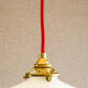 Toothed white opaline pendant lamp with new brass cable and socket