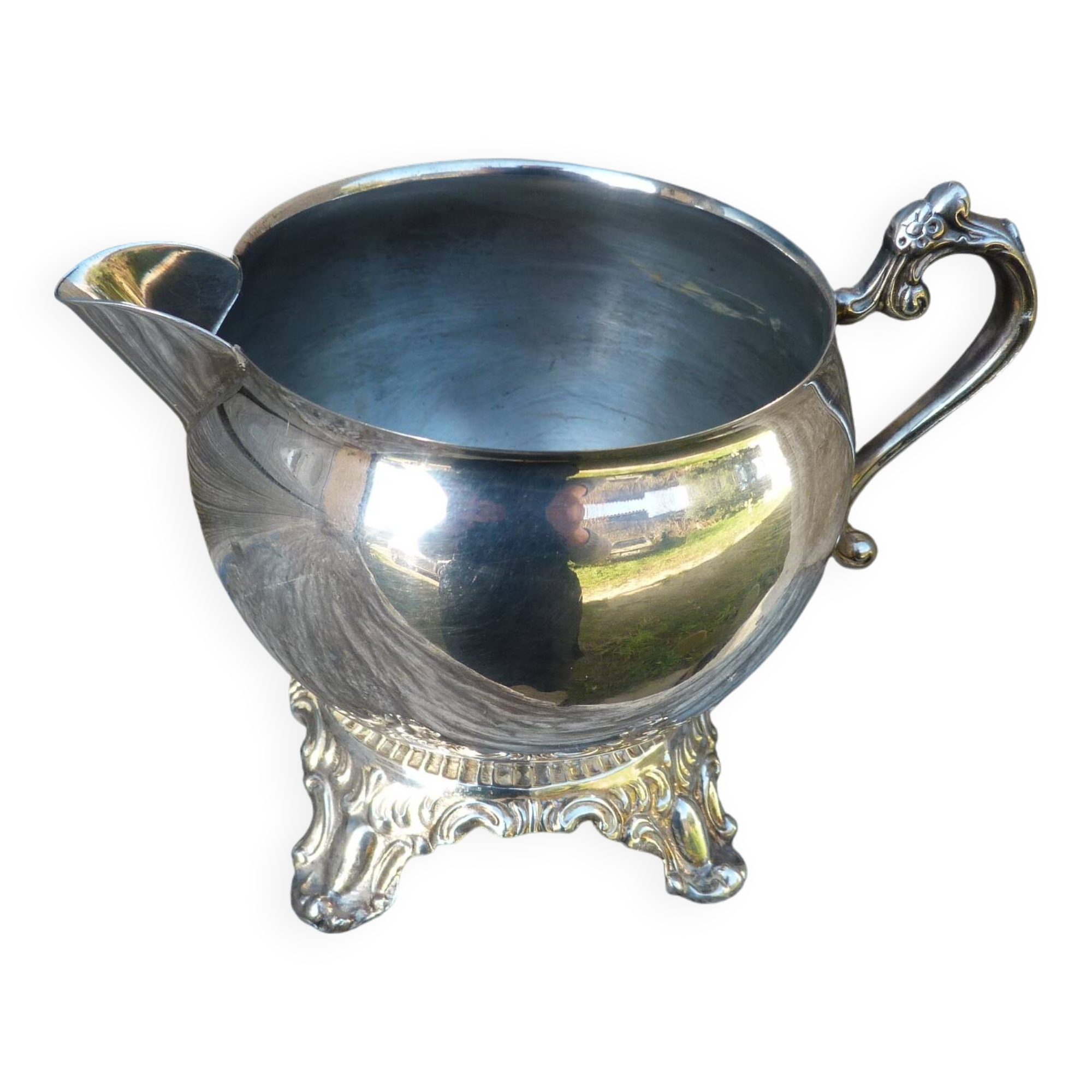 Old silver-plated metal milk or cream jug
