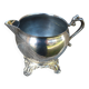Old silver-plated metal milk or cream jug