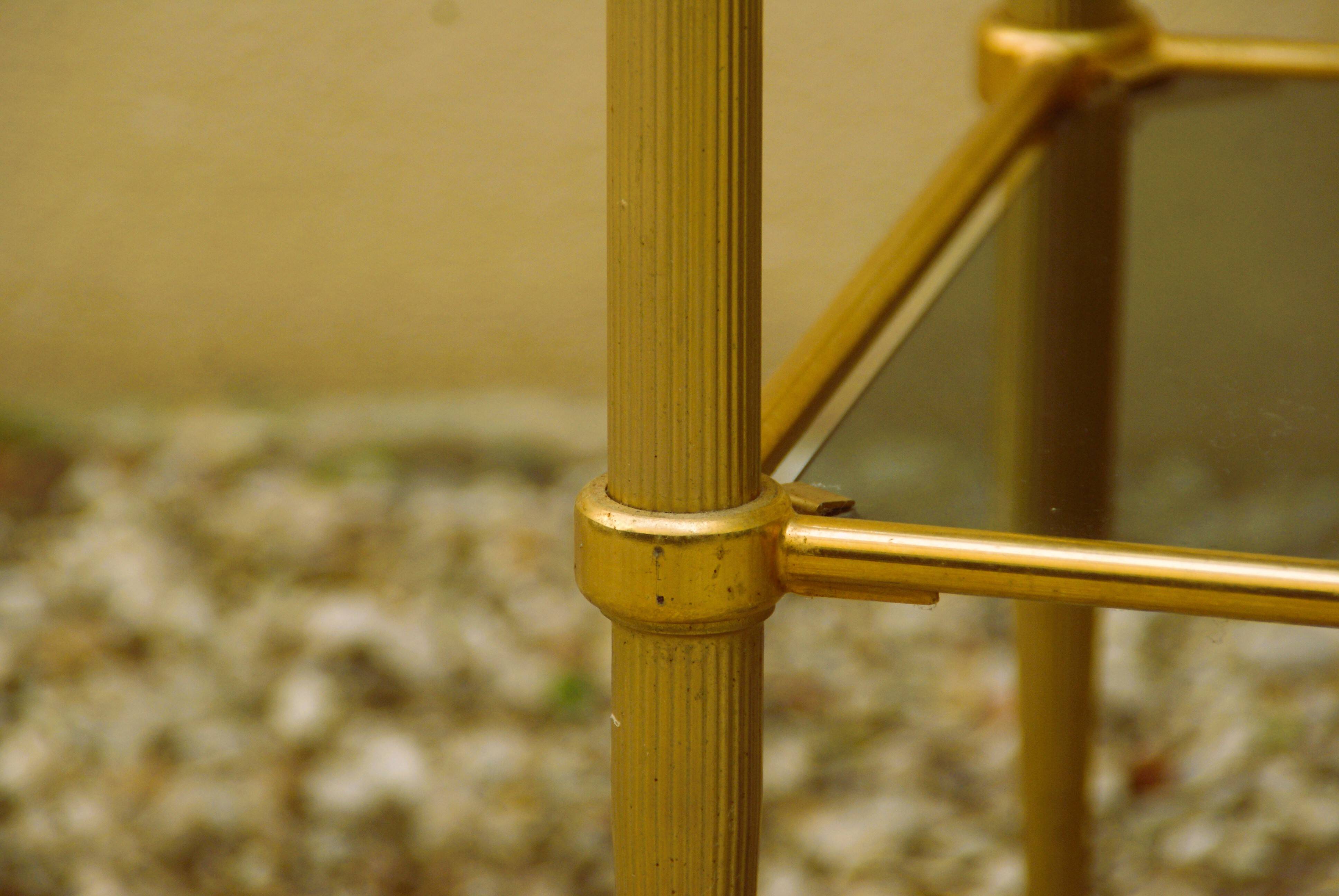Antique brass serving trolley with smoked glass top, Louis XVI style.