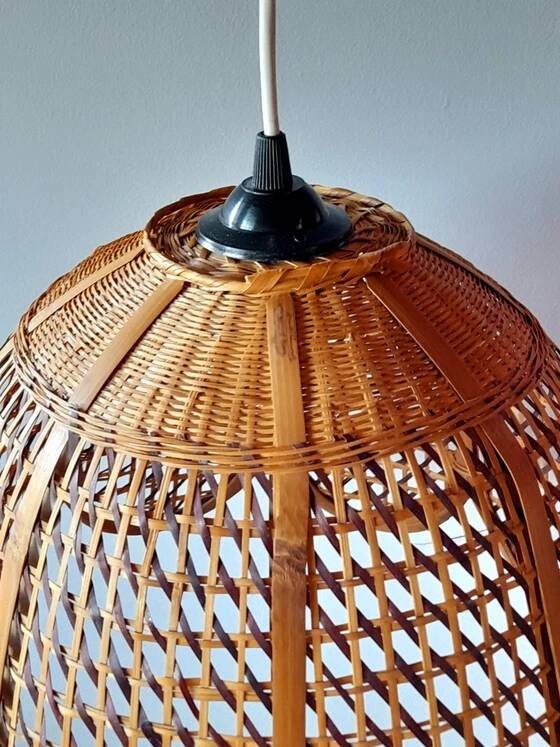 Hanging lamp in openwork bamboo