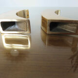 Pair of candle holders in golden brass, 70s