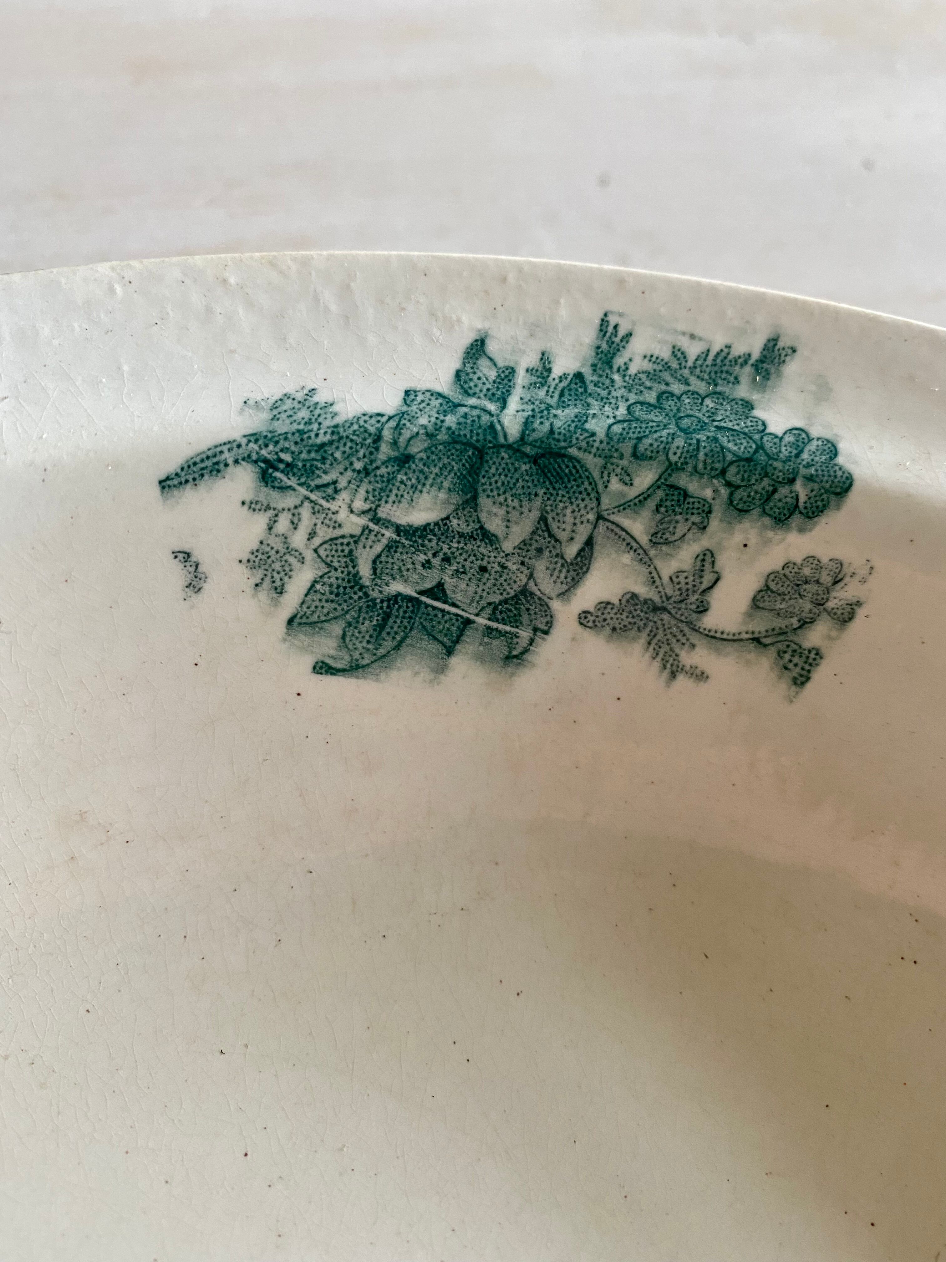 Round dish signed Bertrand Bordeaux model Anémone