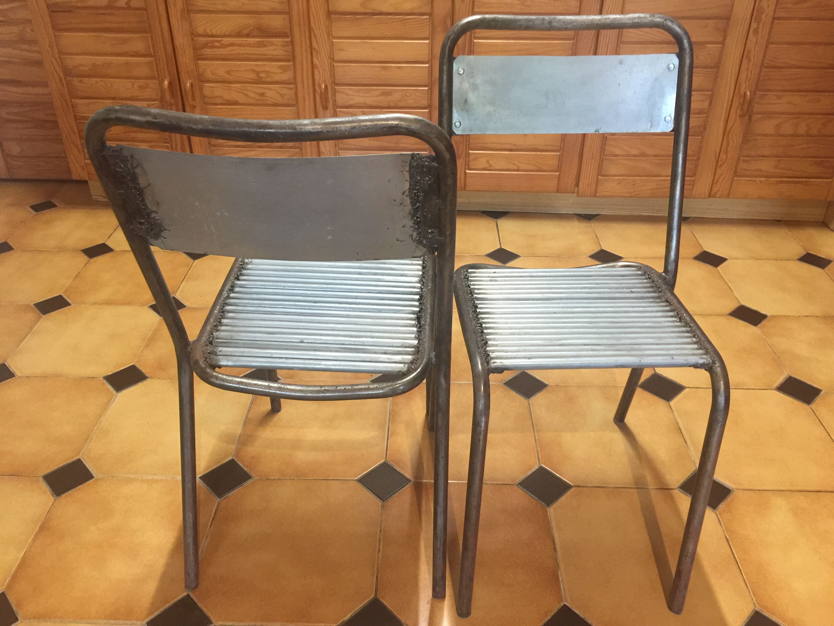 Pair of metal chairs