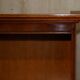 Open library Bradley Furniture made of yew wood with a cupboard base.