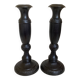Pair of large black metal candlesticks