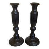 Pair of large black metal candlesticks