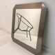 Square mirror in brushed steel