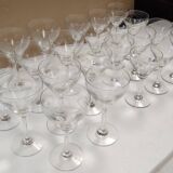 set of 23 champagne glasses or wine glasses in chiseled crystal.