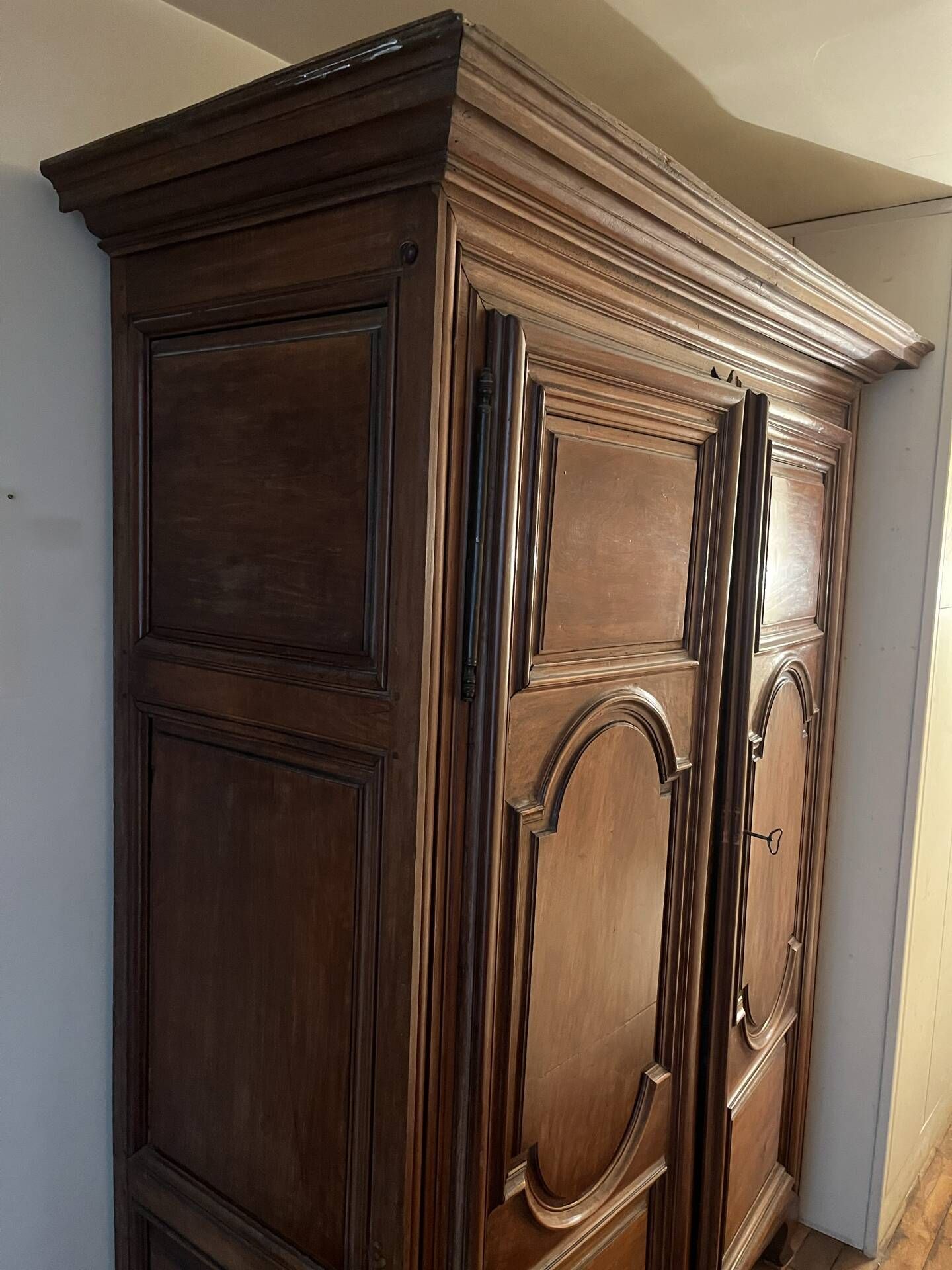 Louis XIV walnut wardrobe with arched panels – 18th century