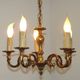 Vintage French traditional style bronze chandelier with 5 lights featuring acanthus leaf details.