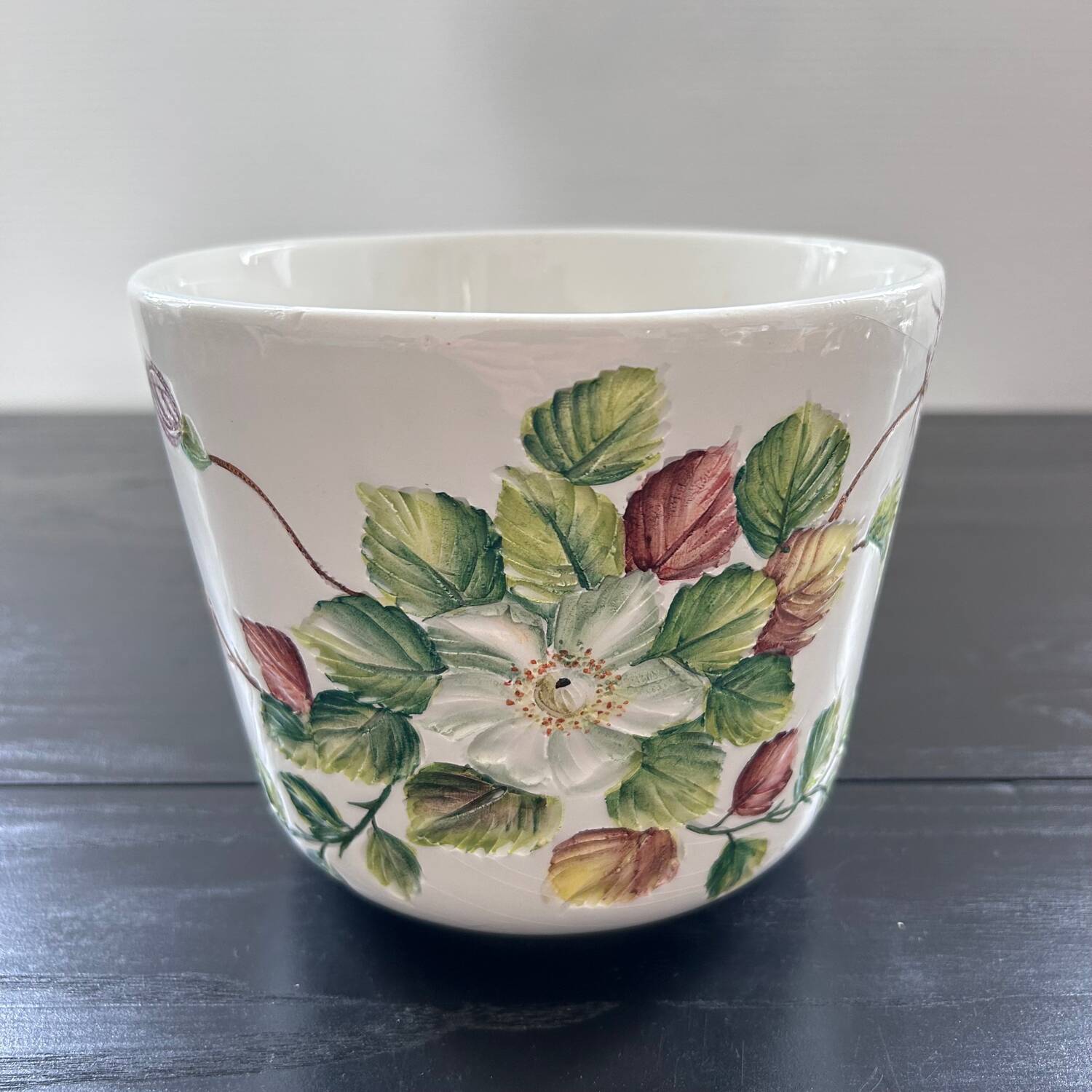 Flower pot with floral decoration in slip