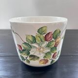 Flower pot with floral decoration in slip