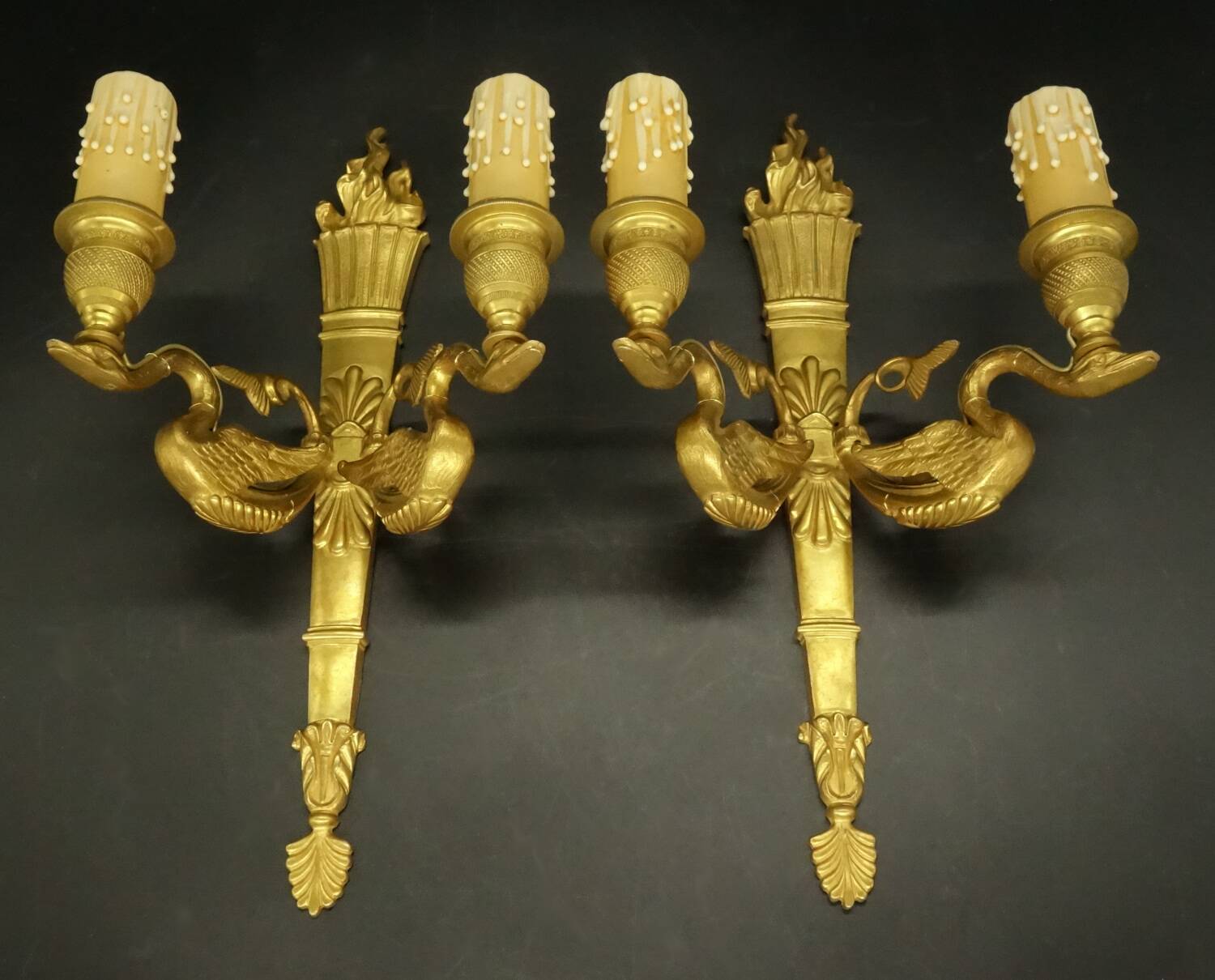 Pair of large Empire style wall lights, torch and swans - gilt bronze