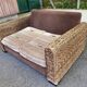Exotic 2-seater sofa in woven banana tree / rattan and brown fabric.