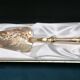 Golden metal pie shovel stamped Fabiora