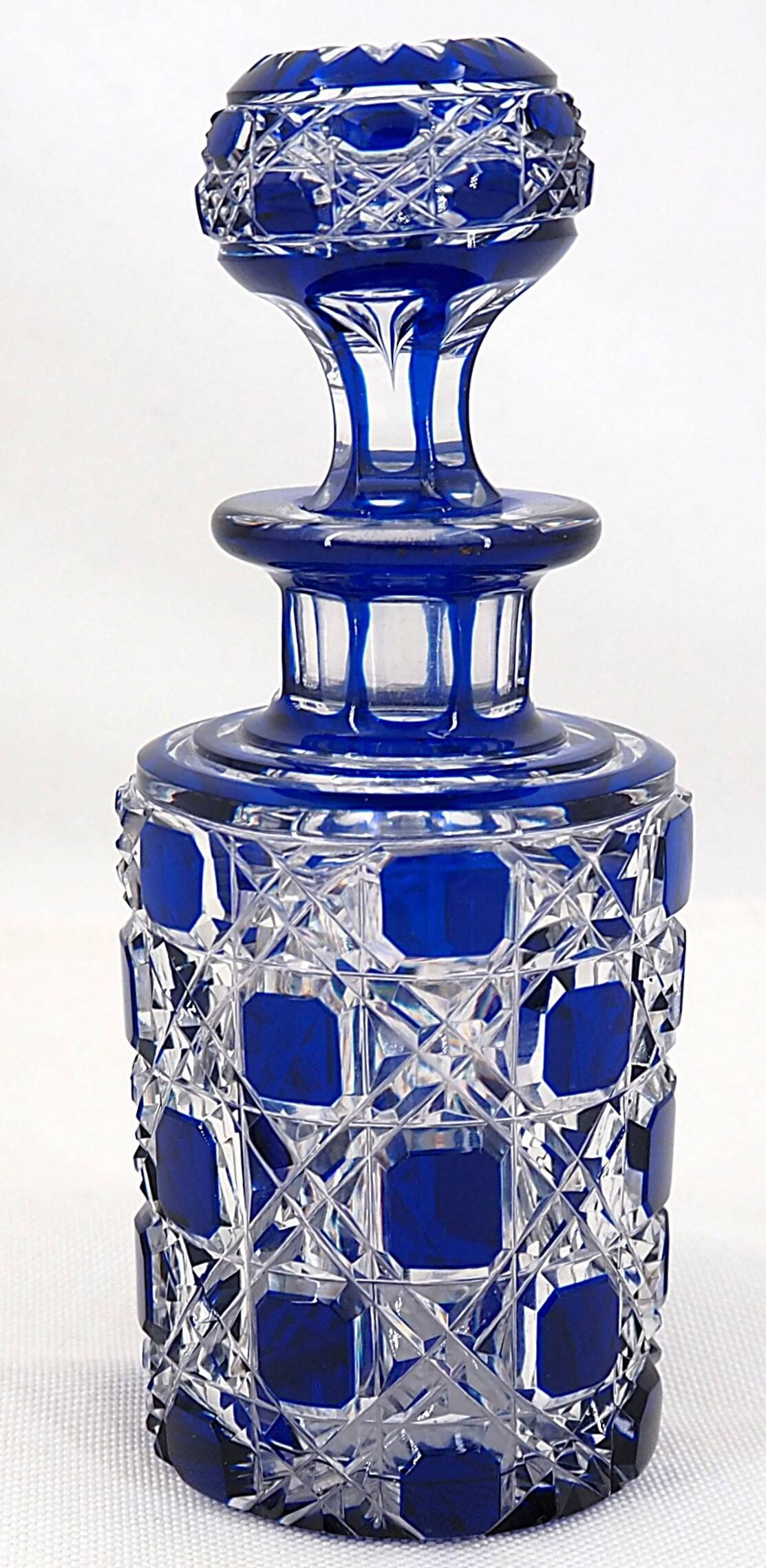 Baccarat, cut crystal bottle, blue lined, diamond gemstones, 14.8 cm.