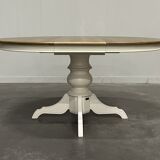 Round extendable oak dining table