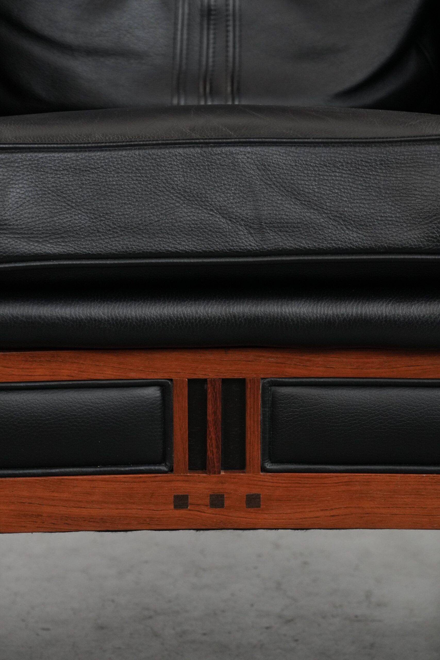 Beautiful and very comfortable black Art Deco design armchair