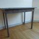 Metal kitchen table with gray speckled enameled top from the 1940s