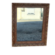 Antique mirror in patinated gilt wood